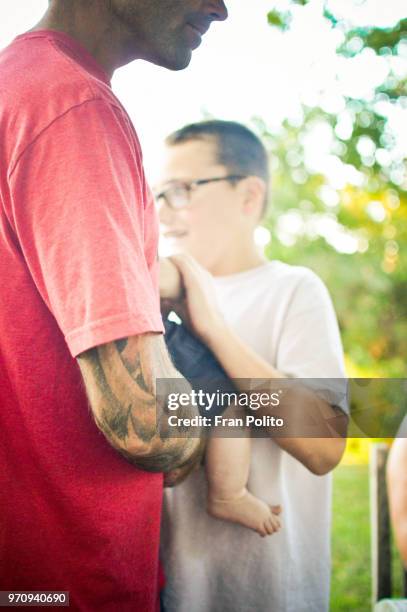 a father and his son. - genderblend2015 stock pictures, royalty-free photos & images