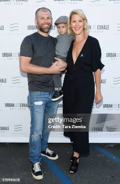 Joe Komar and Stacey Scowley attend attends Urban Exhale Yoga event to "Give Back" Charity for St. Jude Children's Research Hospital on June 9, 2018...