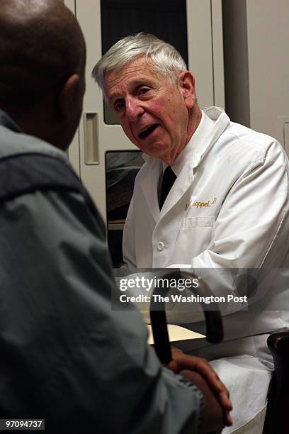 Washington, DC 12/12/05 Urologist Max Koppel drives down from Philadelphia to work a two day shift at Walter Reed Army Medical Center. The...