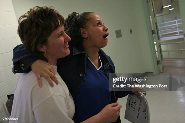 Kimberly Dowden left, of Westminster, Md., and Joyce Hunt of Landover, Md., lend support to each other during an addictions class, part of a pilot...