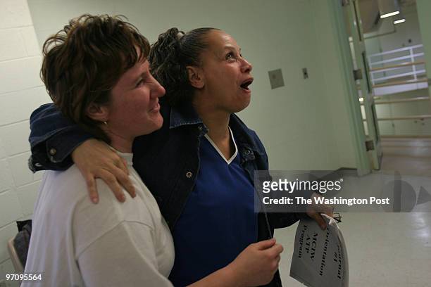 Kimberly Dowden left, of Westminster, Md., and Joyce Hunt of Landover, Md., lend support to each other during an addictions class, part of a pilot...