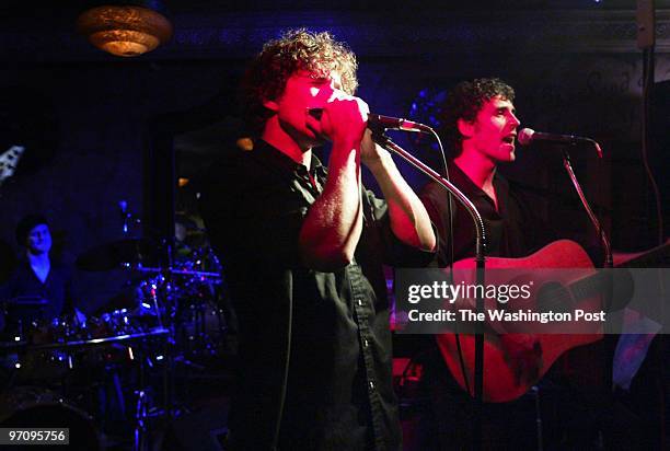 Neg#:158044 Photog:Preston Keres/TWP Fado, Washington, D.C. Lex Fedoryka, of Skythian, plays the harmonica as his brother Danylo jams on the guitar...