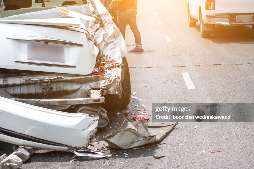 Auto accident involving two cars on a city street