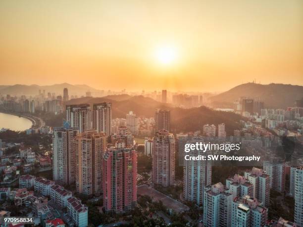 sunset drone photo of zhuhai city, guangdong province, china - zhuhai stock pictures, royalty-free photos & images