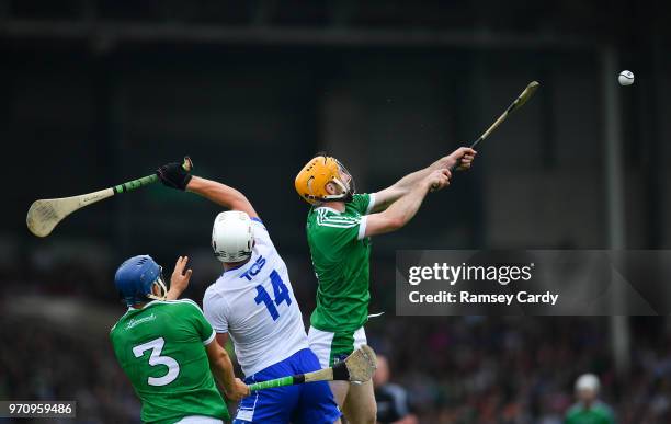 Limerick , Ireland - 10 June 2018; Tom Devine of Waterford in action against Richie English of Limerick during the Munster GAA Hurling Senior...