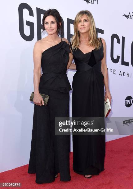 Actors Courteney Cox and Jennifer Aniston arrive at the American Film Institute's 46th Life Achievement Award Gala Tribute to George Clooney on June...