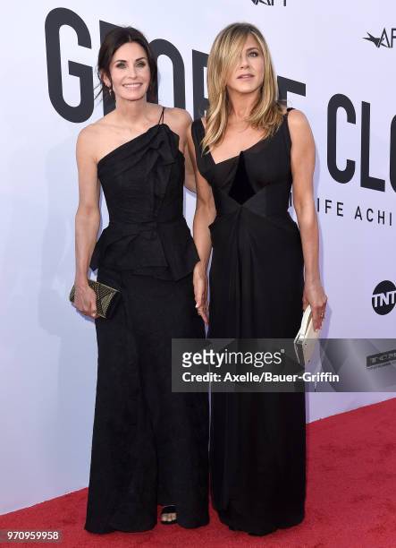 Actors Courteney Cox and Jennifer Aniston arrive at the American Film Institute's 46th Life Achievement Award Gala Tribute to George Clooney on June...