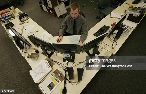 Weather Service PHOTOGRAPHER: Michel du Cille National Weather Service Sterling, VA. NEG#177368 Steve Rogowski, a weather meteorologist at the...