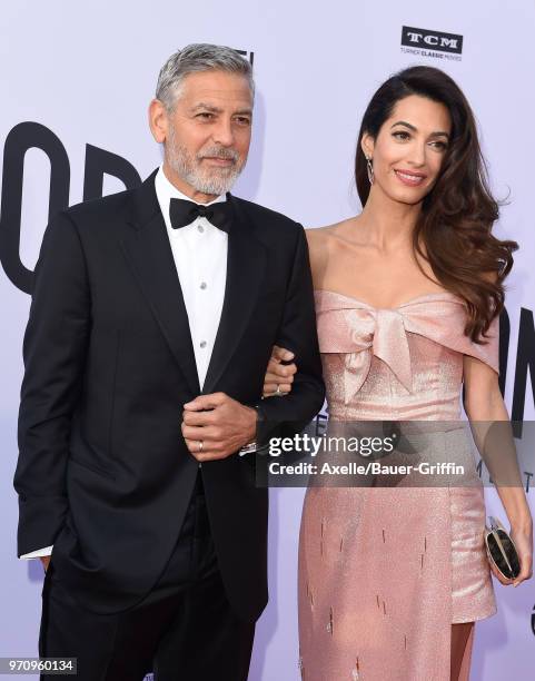 Actor George Clooney and Amal Clooney arrive at the American Film Institute's 46th Life Achievement Award Gala Tribute to George Clooney on June 7,...