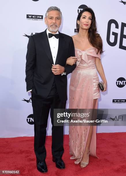 Actor George Clooney and Amal Clooney arrive at the American Film Institute's 46th Life Achievement Award Gala Tribute to George Clooney on June 7,...