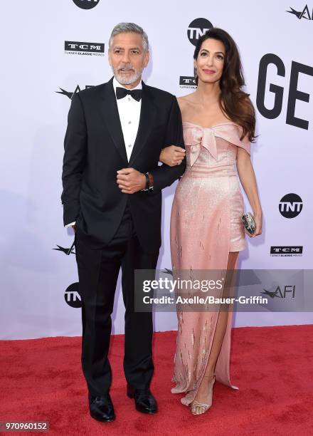 Actor George Clooney and Amal Clooney arrive at the American Film Institute's 46th Life Achievement Award Gala Tribute to George Clooney on June 7,...