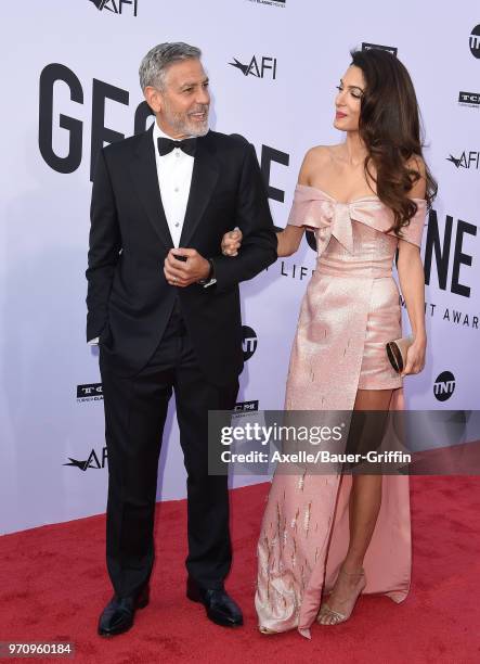 Actor George Clooney and Amal Clooney arrive at the American Film Institute's 46th Life Achievement Award Gala Tribute to George Clooney on June 7,...