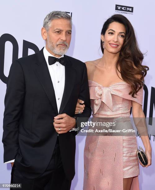 Actor George Clooney and Amal Clooney arrive at the American Film Institute's 46th Life Achievement Award Gala Tribute to George Clooney on June 7,...