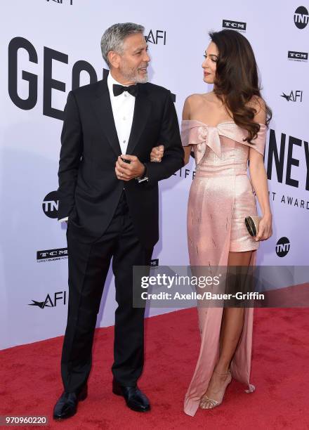 Actor George Clooney and Amal Clooney arrive at the American Film Institute's 46th Life Achievement Award Gala Tribute to George Clooney on June 7,...