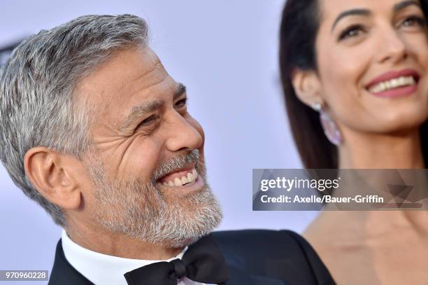 Actor George Clooney and Amal Clooney arrive at the American Film Institute's 46th Life Achievement Award Gala Tribute to George Clooney on June 7,...