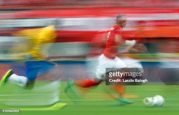 Casemiro of Brazil fights for the ball with Marko Arnautovic of Austria during an International Friendly match at Ernst Happel Stadium on June 10,...