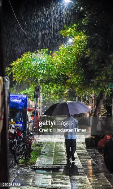 Umbrella Getting Rained On Getting Rained On Photos and Premium High Res Pictures - Getty Images