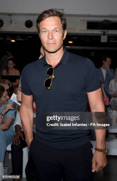 Paul Sculfor on the front row during the Christopher Raeburn London Fashion Week Men's SS19 show at the BFC Spaceshow, London. PRESS ASSOCIATION....