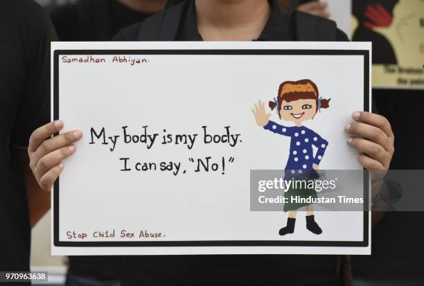 Students take part in Child Sexual Abuse Awareness Walk from Nirbhaya Bus Stand at Munrika Village, on June 10, 2018 in New Delhi, India.