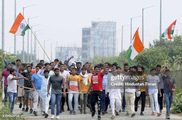 Residents from Noida Extension during a march against the dumping ground at Sector 123, on June 10, 2018 in Noida, India. The National Green Tribunal...