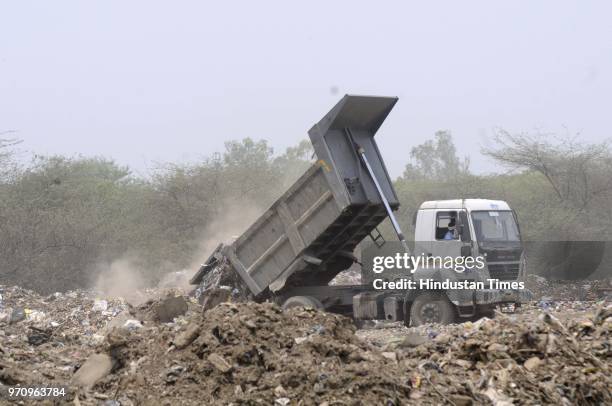 After 10 days of NGT order, waste is still being dumped in Sector 54, on June 10, 2018 in Noida, India. The National Green Tribunal issued an interim...