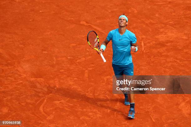 Rafael Nadal of Spain celebrates during the mens singles final against Dominic Thiem of Austria during day fifteen of the 2018 French Open at Roland...