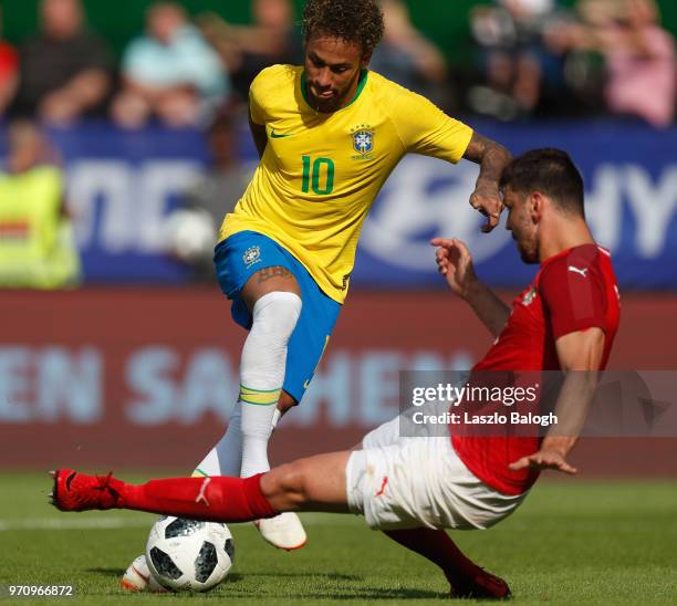 Neymar of Brazil scores against Austria during an International friendly match at Ernst Happel Stadion on June 10, 2018 inVienna, Austria.