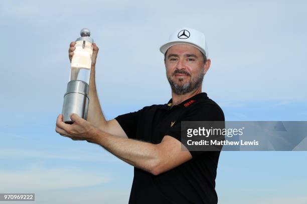 Mikko Korhonen of Finland pose for a photo with his trophy after winning The 2018 Shot Clock Masters during day four of The 2018 Shot Clock Masters...