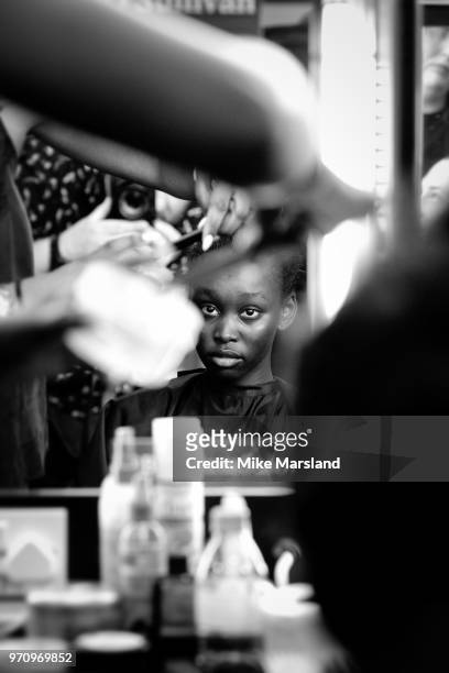 Model backstage ahead of the Christopher Raeburn show during London Fashion Week Men's June 2018 at the BFC Show Space on June 10, 2018 in London,...