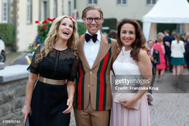 Katja Burkard, Jens Hilbert and Nina Moghaddamt attend the Balve Optimum 2018 Gala on June 8, 2018 in Balve, Germany.