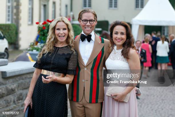 Katja Burkard, Jens Hilbert and Nina Moghaddam attend the Balve Optimum 2018 Gala on June 8, 2018 in Balve, Germany.