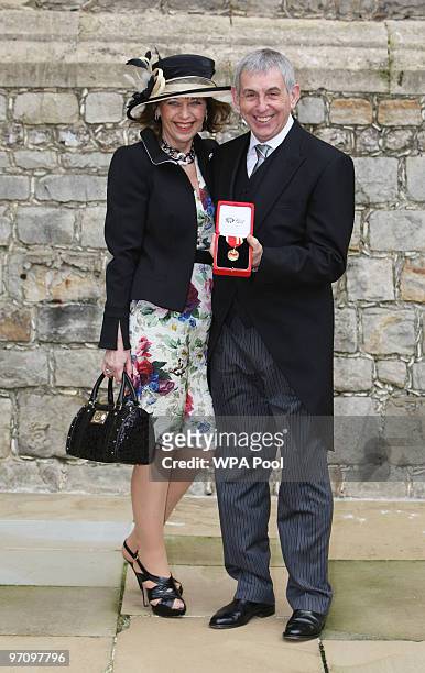 British and Irish Lions coach Sir Ian McGeechan with wife Judy after he was is knighted by Queen Elizabeth II at Windsor Castle on February 26, 2010...