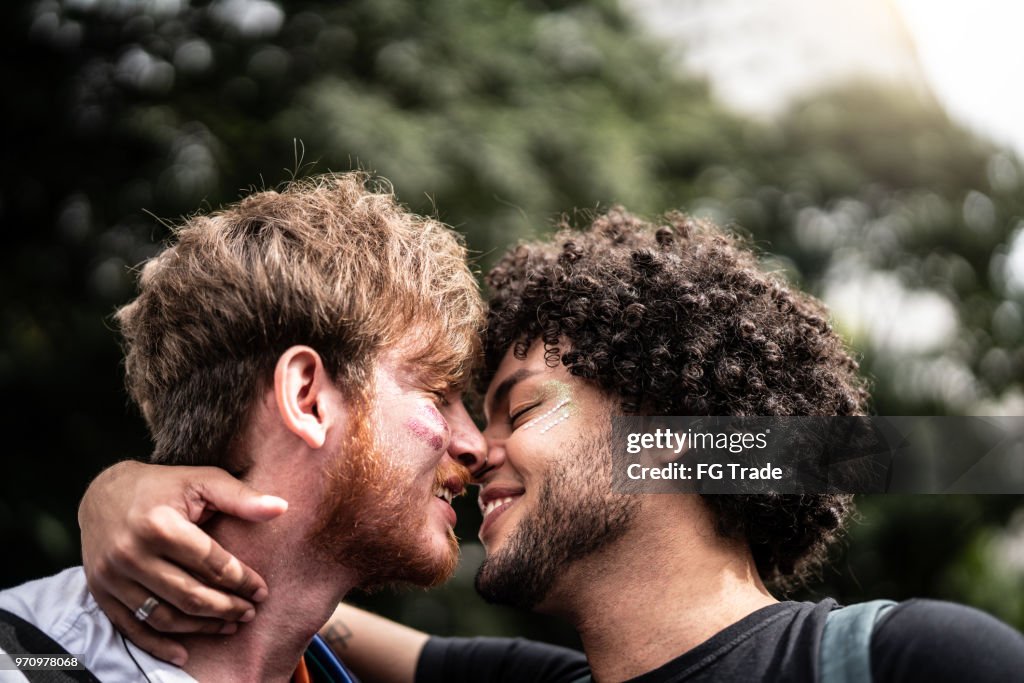 Affection Moment of Gay Couple in Gay Pride Parade