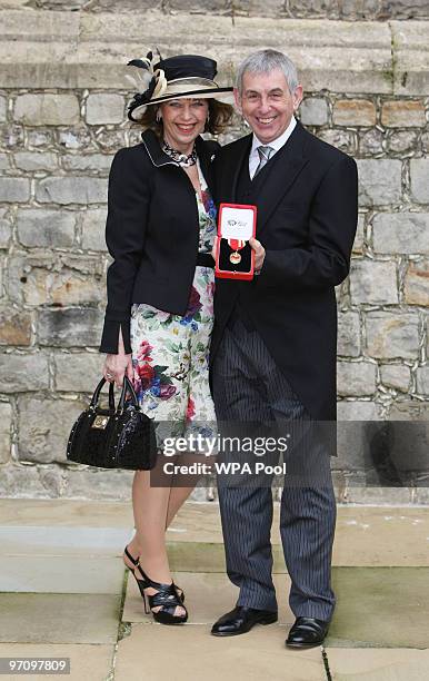 British and Irish Lions coach Sir Ian McGeechan with wife Judy after he was is knighted by Queen Elizabeth II at Windsor Castle on February 26, 2010...