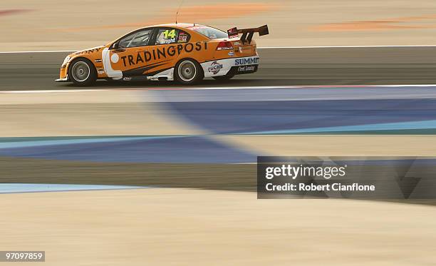 Jason Bright drives the Trading Post Racing Holden during race one for round two of the V8 Supercar Championship Series at Bahrain International...