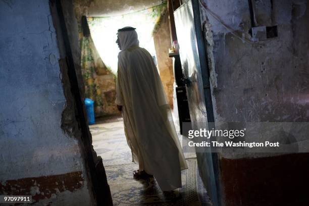 Sheik Jassim Muhammed al-Sweidawi stands in the room where his seven brothers were abducted and killed by Al Qaeda militants. In less than two years...