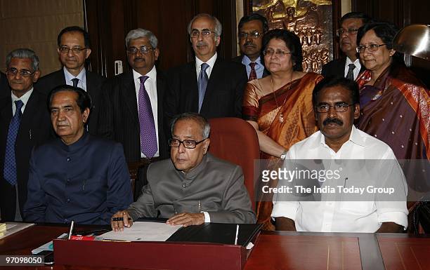 Union Finance Minister Pranab Mukherjee giving final touches to the General Budget 2010-11 along with MoS Revenue S.S. Palanimanickam, MoS Namo...