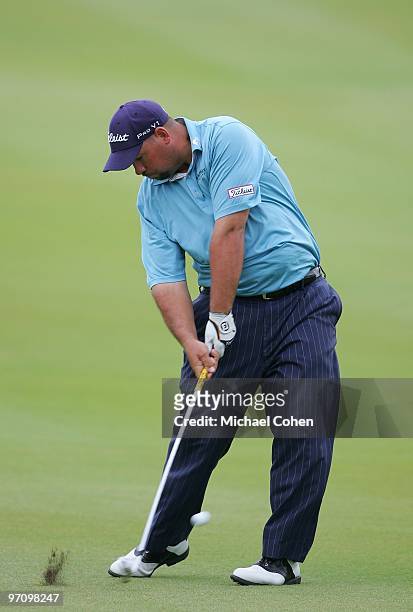 Brendon de Jonge of Zimbabwe hits a shot during the final round of the Mayakoba Golf Classic at El Camaleon Golf Club held on February 21, 2010 in...
