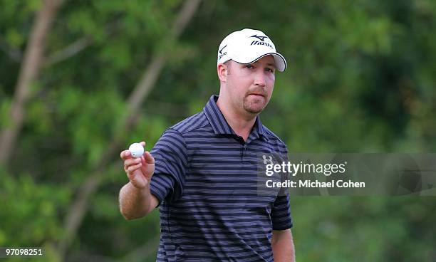 Chad Collins waves his ball in the air during the final round of the Mayakoba Golf Classic at El Camaleon Golf Club held on February 21, 2010 in...