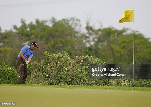 Erik Compton chips to the green during the second round of the Mayakoba Golf Classic at El Camaleon Golf Club held on February 19, 2010 in Riviera...