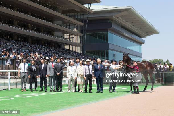 Jockey Mirco Demuro and owner Masamichi Hayashi celebrate after Akanesasu winning the Race 6 at Tokyo Racecourse on June 3, 2018 in Tokyo, Japan.