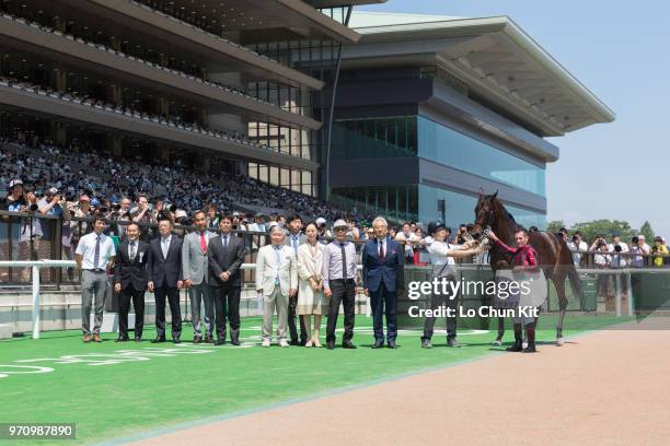 Jockey Mirco Demuro and owner Masamichi Hayashi celebrate after Akanesasu winning the Race 6 at Tokyo Racecourse on June 3, 2018 in Tokyo, Japan.