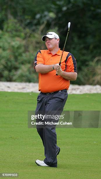 Jarrod Lyle of Australia hits a shot during the second round of the Mayakoba Golf Classic at El Camaleon Golf Club held on February 19, 2010 in...