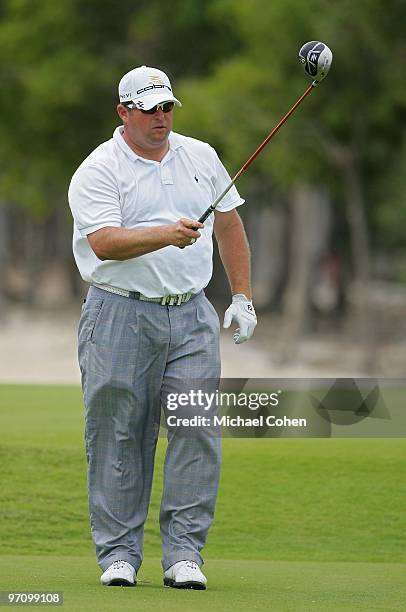 Jason Gore watches his shot during the second round of the Mayakoba Golf Classic at El Camaleon Golf Club held on February 19, 2010 in Riviera Maya,...