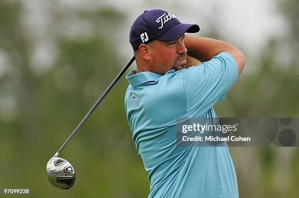 Brendon de Jonge of Zimbabwe hits a shot during the final round of the Mayakoba Golf Classic at El Camaleon Golf Club held on February 21, 2010 in...