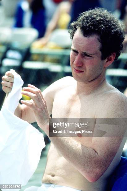John McEnroe plays tennis at the US Open circa 1995 in New York City.