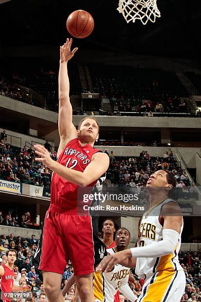 Rasho Nesterovic of the Toronto Raptors puts up a shot against Danny Granger of the Indiana Pacers during the game on February 2, 2010 at Conseco...