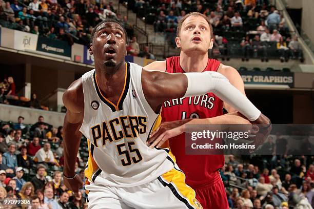 Roy Hibbert of the Indiana Pacers boxes out Rasho Nesterovic of the Toronto Raptors during the game on February 2, 2010 at Conseco Fieldhouse in...