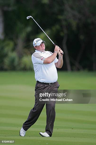 Jarrod Lyle of Australia watches his shot during the third round of the Mayakoba Golf Classic at El Camaleon Golf Club held on February 20, 2010 in...