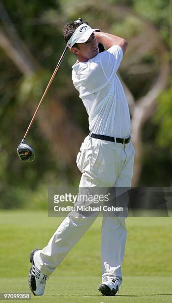 Mark Hensby of Australia hits a shot during the third round of the Mayakoba Golf Classic at El Camaleon Golf Club held on February 20, 2010 in...